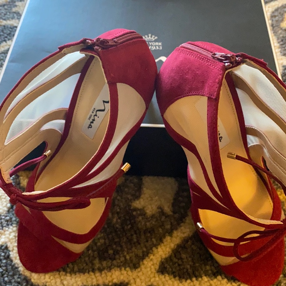 New, never worn, suede peep toe, back zip, faux ankle tie stiletto.